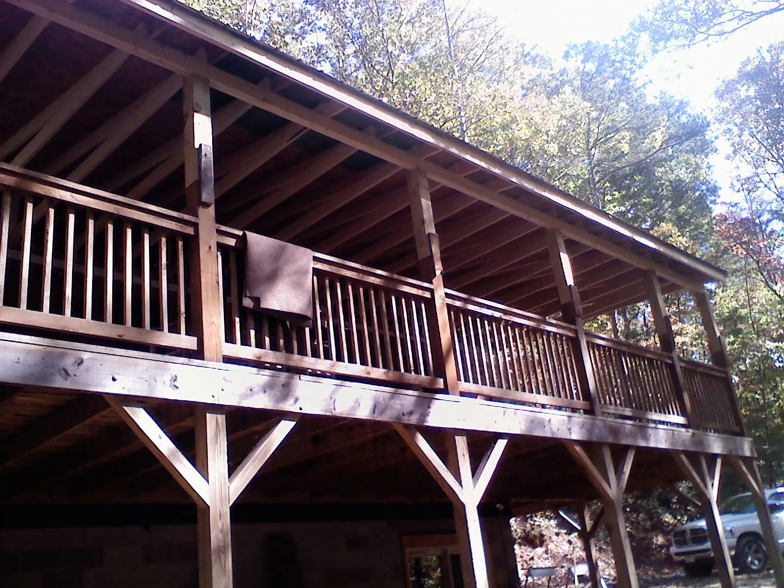 Timber framing under a new elevated porch and deck — Roof Leak Repair in Pease by Roofing Brothers